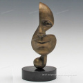Professional supplier provide abstract art figurines golden faces statue for interior ornament